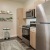 a kitchen with stainless steel appliances