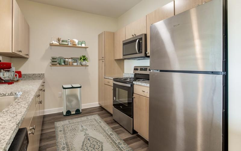 a kitchen with stainless steel appliances