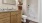 a bathroom with a tub, shower, and toilet